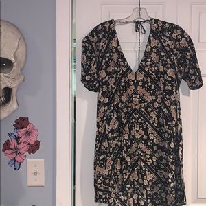 Floral tunic top with buttons down front